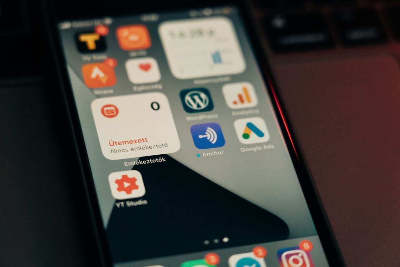 Services Close-up view of smartphone screen featuring various app icons and notifications.