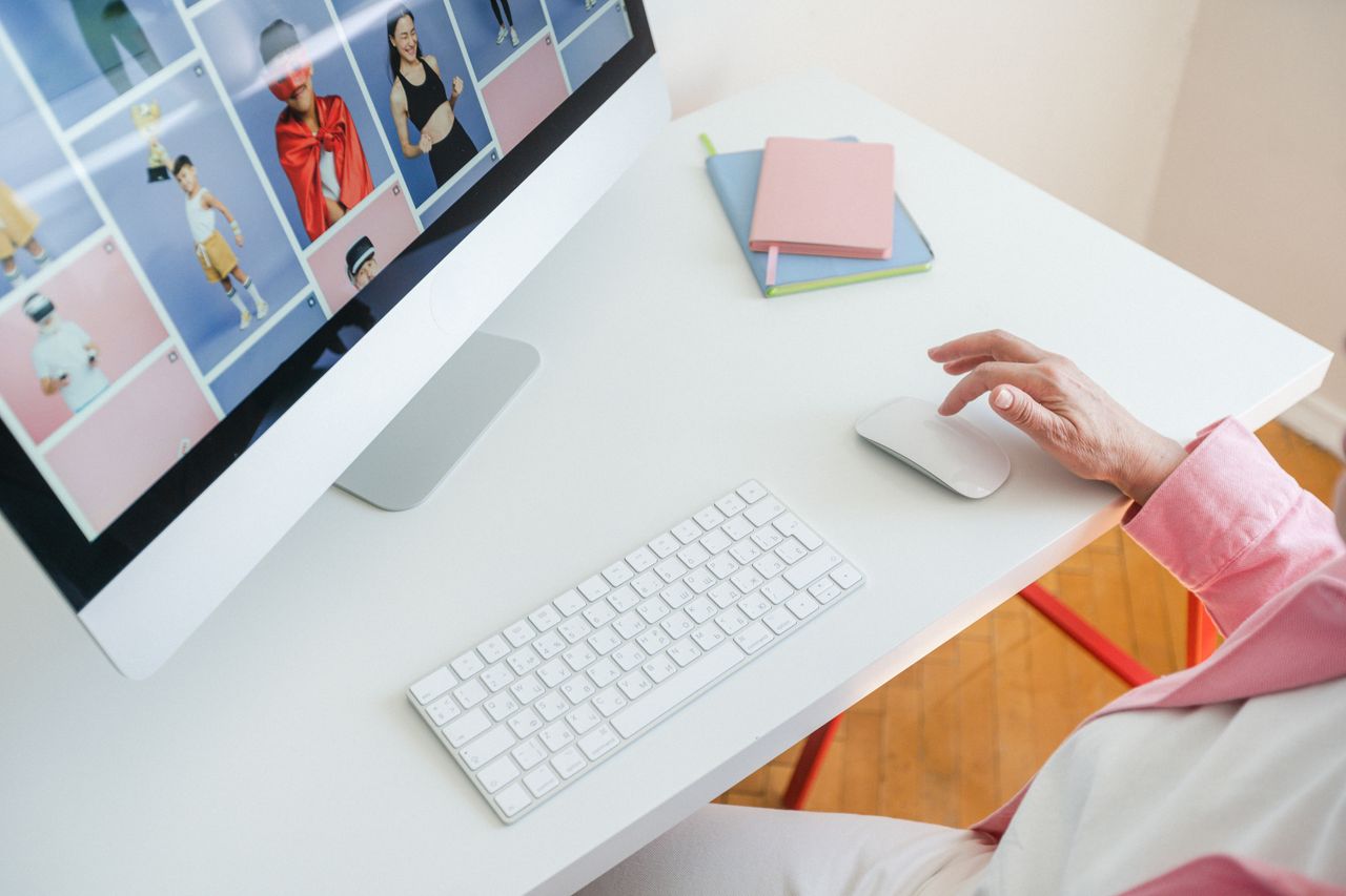 About Bright and modern workspace setup with a desktop computer, mouse, and keyboard on a white desk.